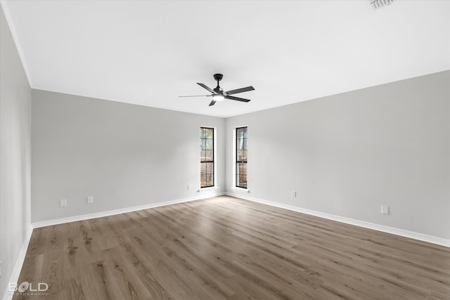 unfurnished room featuring wood-type flooring and ceiling fan