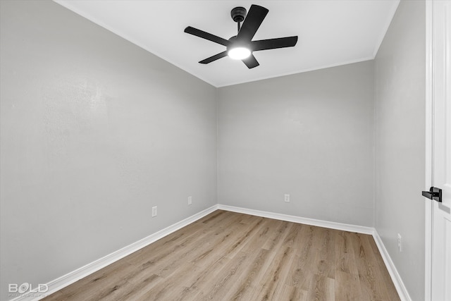 spare room with ceiling fan, crown molding, and light hardwood / wood-style flooring