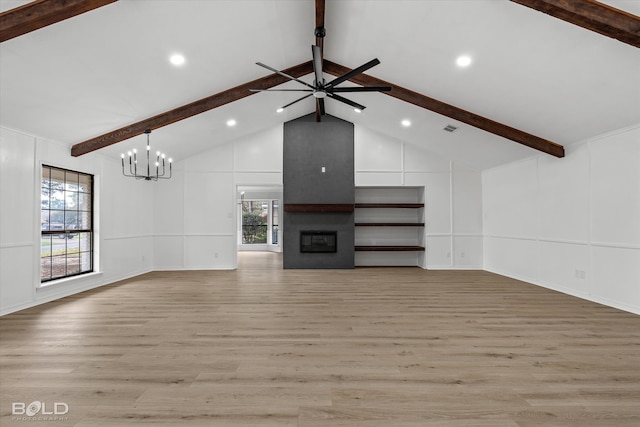 unfurnished living room with beamed ceiling, light hardwood / wood-style floors, and high vaulted ceiling