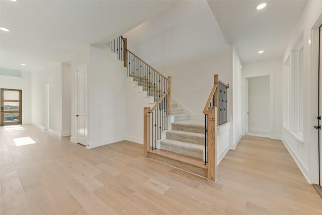 foyer with light hardwood / wood-style floors