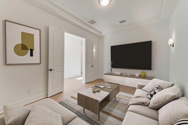 living room with light hardwood / wood-style flooring