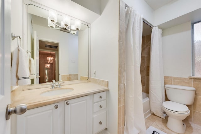 full bathroom with toilet, tile patterned flooring, tile walls, shower / bathtub combination with curtain, and vanity