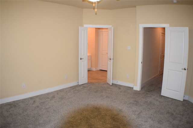 unfurnished bedroom with carpet