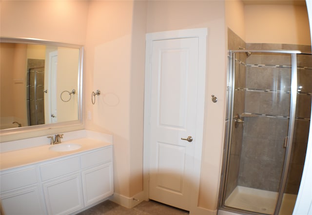 bathroom featuring vanity and walk in shower