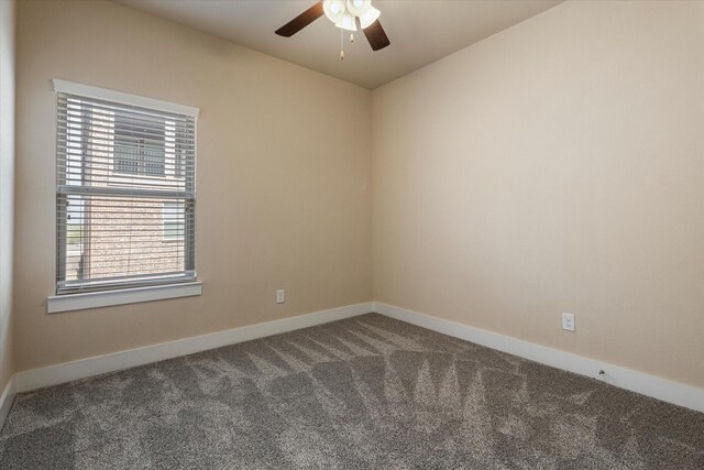 carpeted empty room with ceiling fan