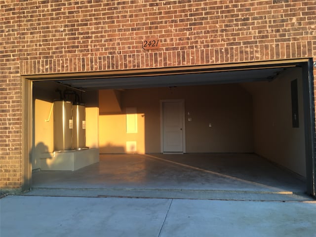 garage featuring water heater