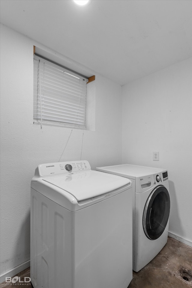 laundry area featuring washing machine and dryer