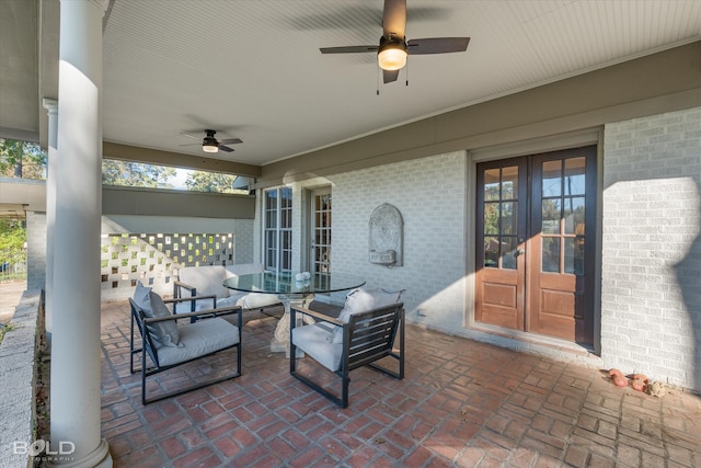 view of patio / terrace with ceiling fan and french doors