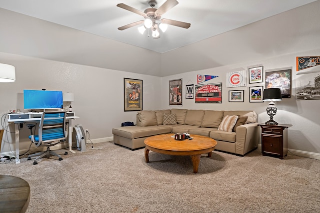 carpeted living room with ceiling fan