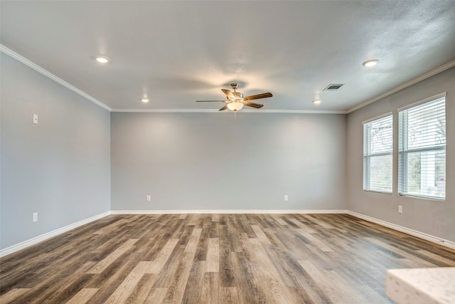 unfurnished room featuring ceiling fan, hardwood / wood-style floors, and ornamental molding