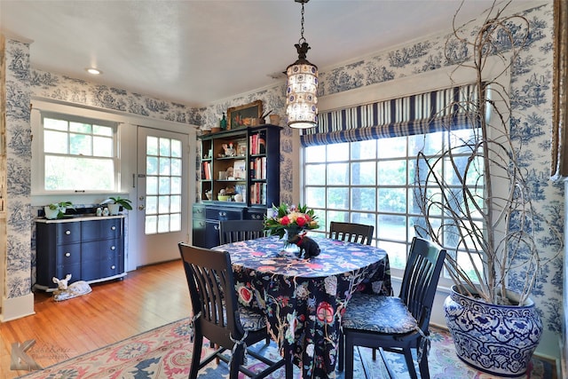 dining space featuring hardwood / wood-style floors