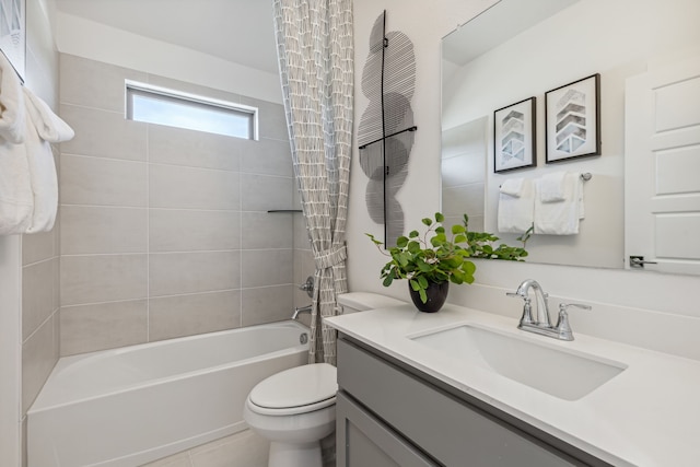 full bathroom with vanity, shower / bath combination with curtain, and toilet