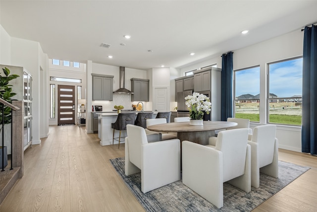 dining room featuring light hardwood / wood-style floors