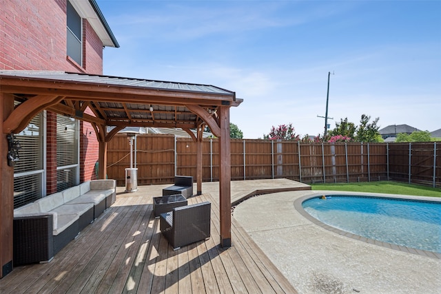 view of pool with a deck