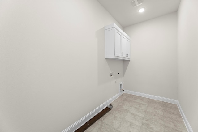 3208 Andesite Rd, Mckinney, TX 75071 - laundry area featuring hookup for an electric dryer, washer hookup, baseboards, and cabinet space