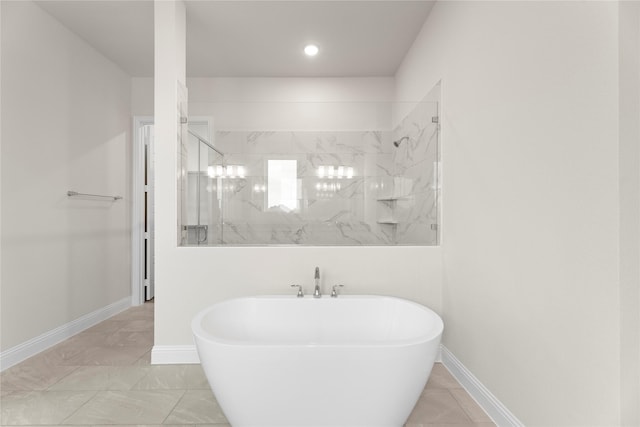 3208 Andesite Rd, Mckinney, TX 75071 - bathroom with a shower stall, a freestanding bath, and baseboards