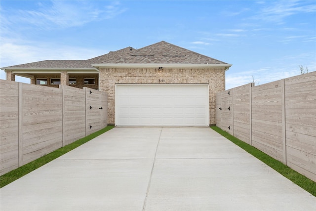 3208 Andesite Rd, Mckinney, TX 75071 - garage with fence and concrete driveway