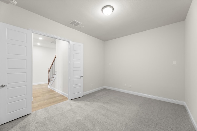 3208 Andesite Rd, Mckinney, TX 75071 - carpeted spare room with baseboards and stairway
