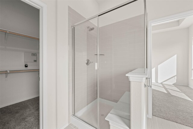 bathroom featuring walk in shower