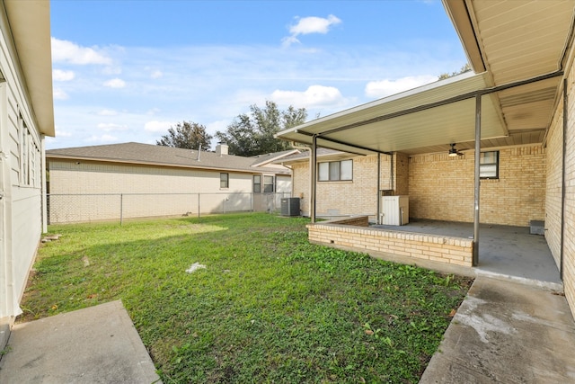 view of yard with a patio and cooling unit