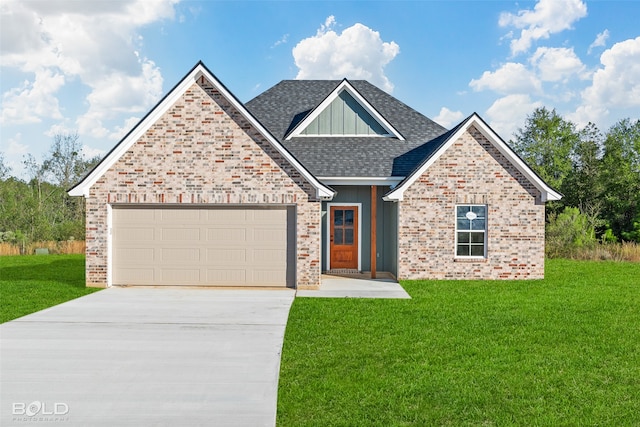 view of front of property featuring a front yard and a garage