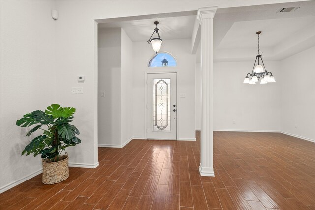 entryway featuring decorative columns