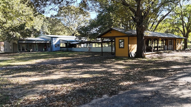 exterior space featuring a carport