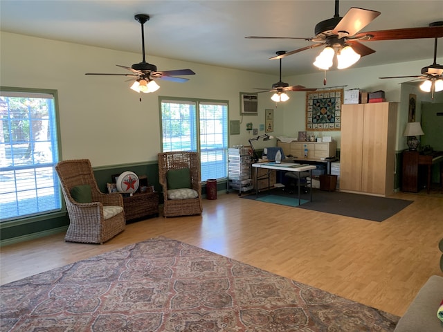 interior space featuring an AC wall unit and hardwood / wood-style flooring