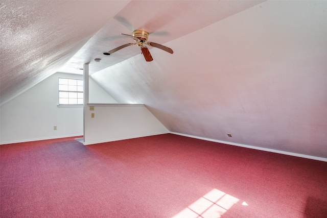 bonus room with ceiling fan, carpet, and lofted ceiling