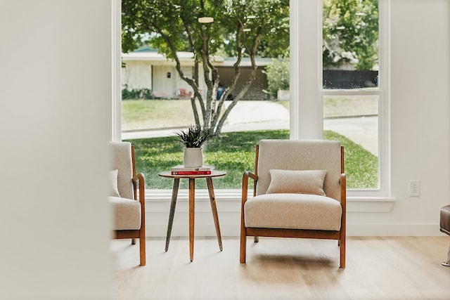 sitting room featuring hardwood / wood-style flooring