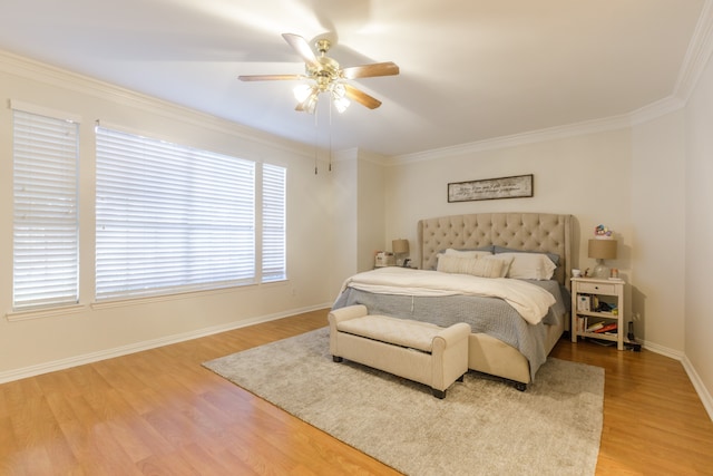 bedroom featuring wood-type flooring, ceiling fan, and ornamental molding