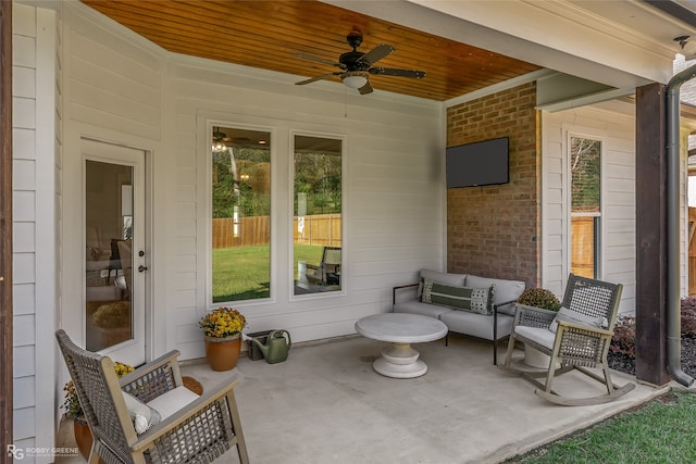 view of patio with ceiling fan and an outdoor hangout area