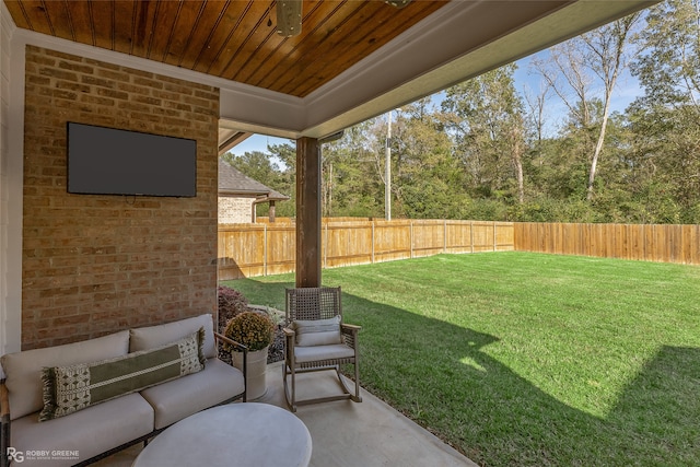 view of yard featuring a patio area and an outdoor living space