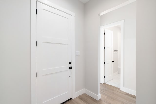 foyer with light hardwood / wood-style flooring