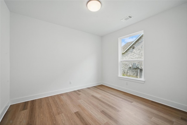 4182 Carter Ct, Denison, TX 75020 - empty room featuring wood finished floors and baseboards