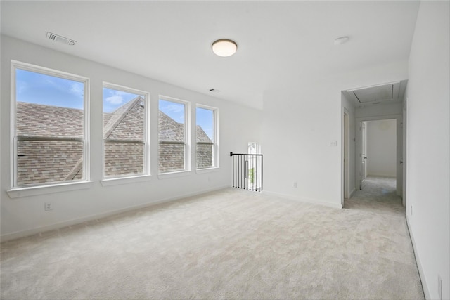 4182 Carter Ct, Denison, TX 75020 - carpeted empty room with attic access and baseboards