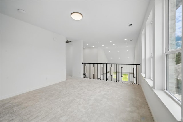 4182 Carter Ct, Denison, TX 75020 - spare room featuring light carpet and recessed lighting