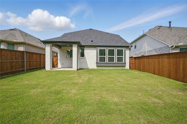 4182 Carter Ct, Denison, TX 75020 - rear view of house with brick siding, a patio area, and a shingled roof
