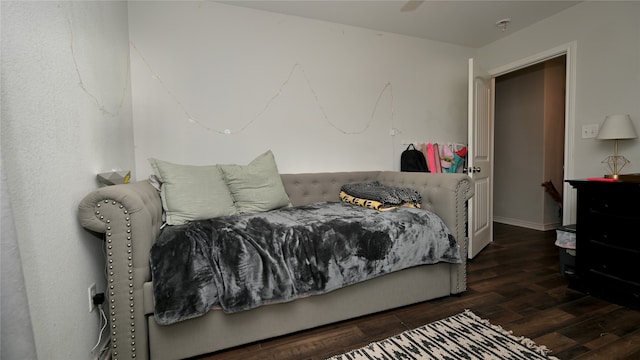 bedroom featuring dark wood-type flooring