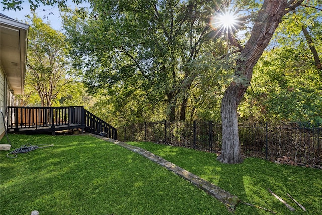 view of yard featuring a wooden deck