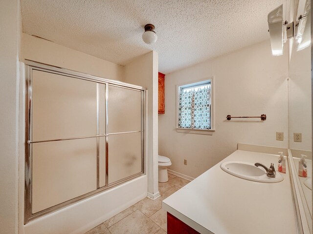 tiled empty room with ceiling fan, wood walls, a textured ceiling, and french doors