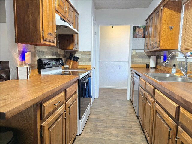 full bathroom with shower / tub combo, vanity, a textured ceiling, hardwood / wood-style floors, and toilet