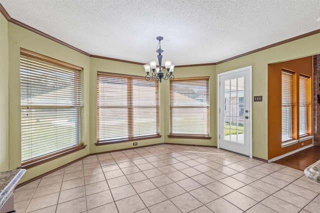 unfurnished living room featuring visible vents, a fireplace, a textured ceiling, and wood finished floors