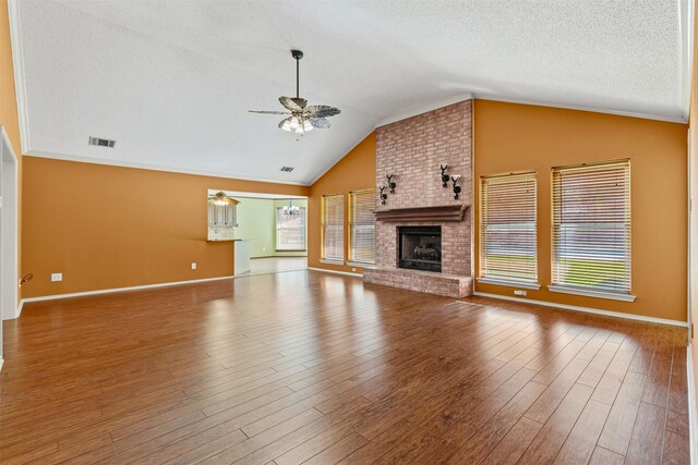 bedroom with dark wood-style flooring, a raised ceiling, a ceiling fan, and baseboards