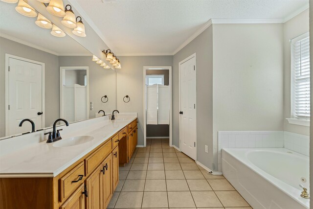 ensuite bathroom with ensuite bathroom, tile patterned flooring, vanity, ornamental molding, and a stall shower