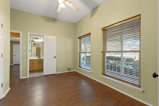 full bath with toilet, shower / bath combination, tile patterned floors, and vanity