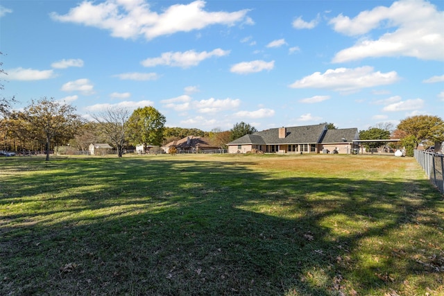 view of yard with fence