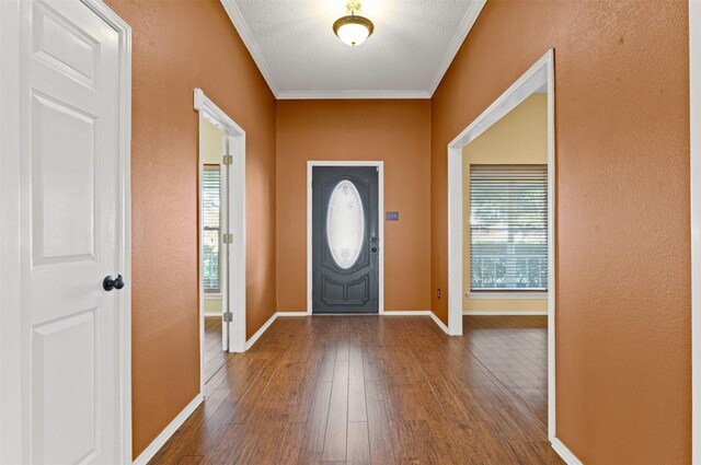 empty room with dark wood-style floors, a ceiling fan, and baseboards