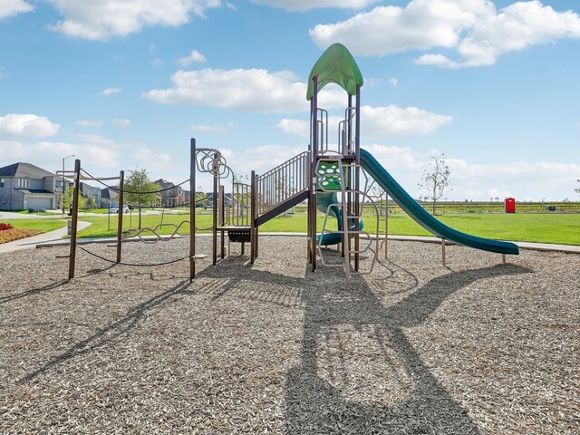 view of play area with a yard