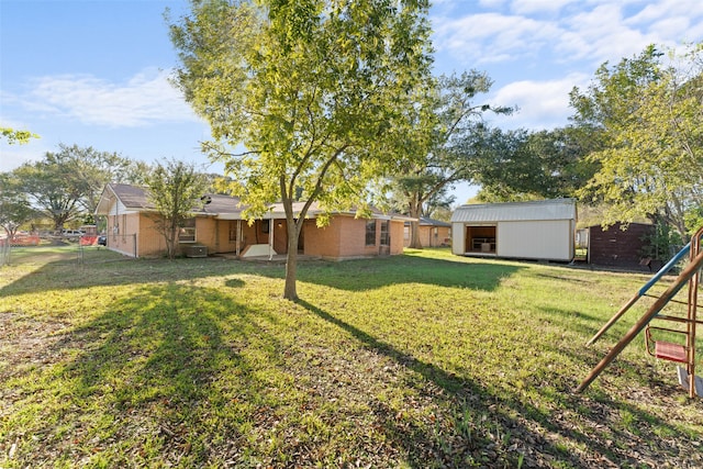 view of yard with a storage shed